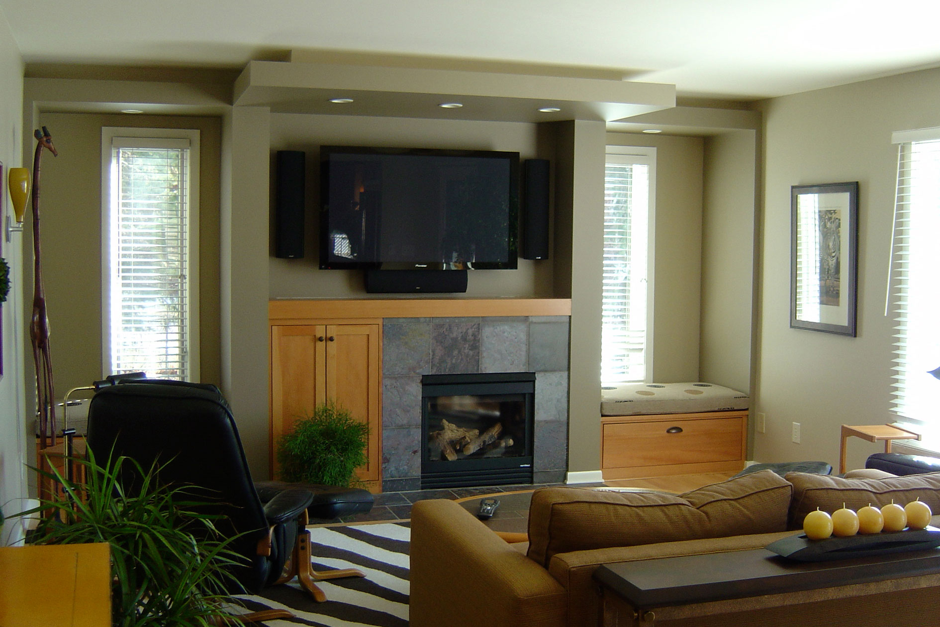 Family Room with New Fireplace, Entertainment Center, and Window Seats