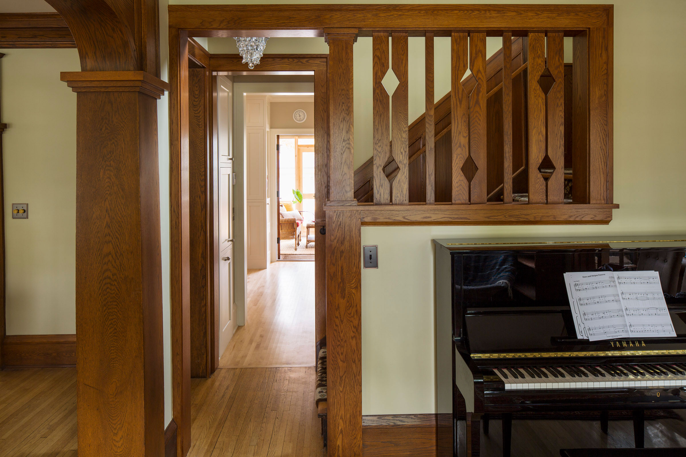 New Stair Opening & Wood Screen with the Kitchen Beyond