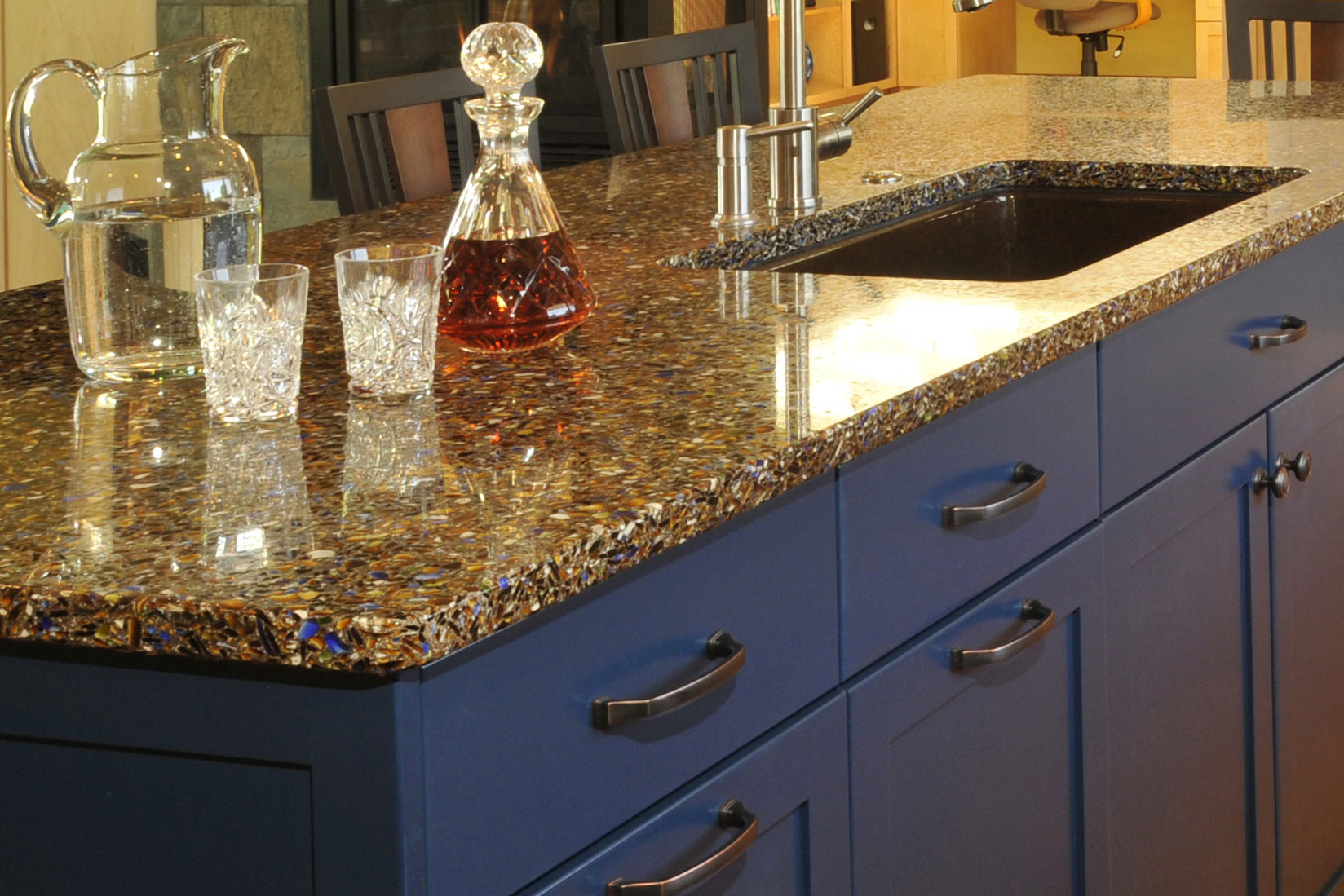 Recycled Glass Top & Blue Cabinetry Complementing the Glass Colors