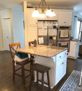 Original Kitchen Island West with Back Entry Beyond